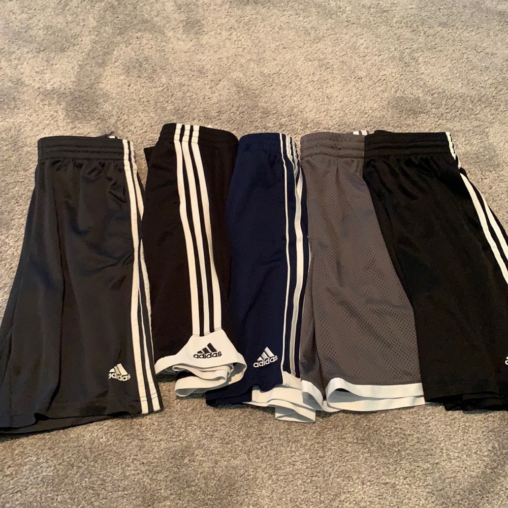FIVE pairs of adidas gym shorts.